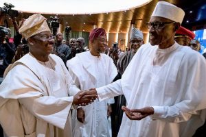 President Muhammadu Buhari right with Governor Abiola Ajimobi of Oyo State