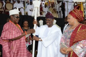 L-R: Ekerin Olubadan of Ibadanland, Oba Abiodun Kola-Daisi; Oyo State Governor, Senator Abiola Ajimobi; and his wife, Florence, during the presentation of staff of office and certificates to the high chiefs and baales 