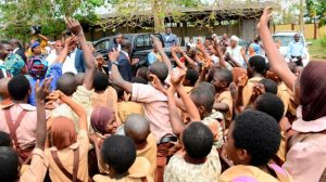 Governor Rauf Aregbesola with students