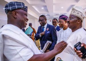 L R Akinwunmi Ambode of Lagos an official Rauf Aregbesola of Osun and Abiola Ajimobi of Oyostill at the meeting