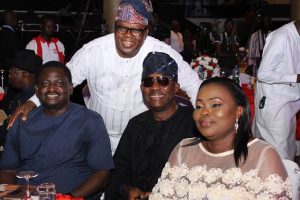 Femi Adesina, left, with others at the event...