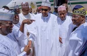 Oyo's Governor Abiola Ajimobi, right, with President Muhammadu Buhari and others in Kano...
