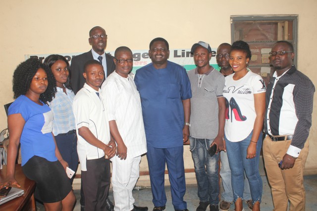 Chief Femi Adesina in a group photograph with a section of Parrotmen