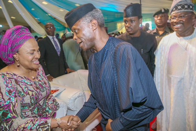 Vice President Yemi Osinbajo middle with Governor Abiola Ajimobi right and his wife Mrs Florence