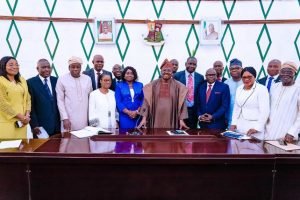 Governor Abiola Ajimobi in a group photograph with the new Permanent Secretaries and others
