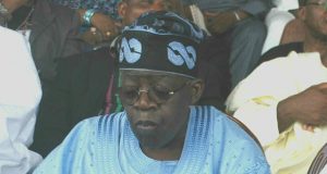 Tinubu Unveils Plans To Explain How Jonathan Was Booted Out Of Power ...Asiwaju Bola Ahmed Tinubu...with a copy of Parrot Xtra Magazine, our sister publication...