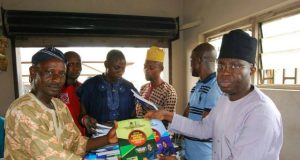 Photo News: Senator Adesoji Akanbi Presents SSCE/GCE/NECO Q&A Textbooks To Students Of Oyo South Adesoji Akanbi