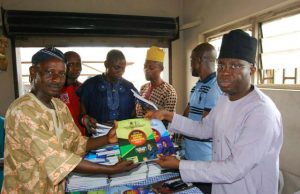 Photo News: Senator Adesoji Akanbi Presents SSCE/GCE/NECO Q&A Textbooks To Students Of Oyo South Adesoji Akanbi