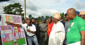 Ajimobi Inaugurates Pacesetter Integrated Farms …The representative of Songhai Farms (Porto-Novo), Mr Sintoudi Chainlenane (left) showing the master plan of how Pacesetter Farms (Songhai model) will be operated to Oyo State Governor, Senator Abiola Ajimobi and Special Adviser on Agriculture, Prof Olusegun Adekunle at the farm…