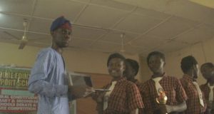 Dapo Lam-Adesina Holds 2nd Omo Oloore Quiz Competition …Hon Adedapo Lam-Adesina, presenting a laptop to one of the winners