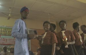 Dapo Lam-Adesina Holds 2nd Omo Oloore Quiz Competition …Hon Adedapo Lam-Adesina, presenting a laptop to one of the winners