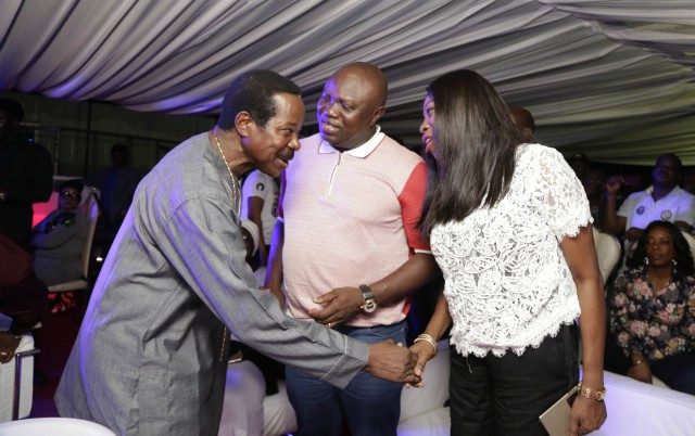 King Sunny Ade, left, Governor Akinwunmi Ambode and his wife...