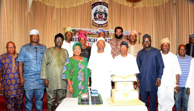 …Governor State of Osun, Ogbeni Rauf Aregbesola (centre); his Deputy, Mrs Titi Laoye-Tomori (4th left); Chief of Staff to the Governor, Alhaji Gboyega Oyetola (4th right); Director, Bureau of Communications and Strategy, Alhaji Semiu Okanlawon (3rd right); Chairman, Osun State Broadcasting Corporation (OSBC) Board of Directors, Mr Kola Akanji (3rd left); Former Managing Editor, Osun Defender Newspaper, Mr Kola Olabisi (left); Special Adviser to Governor Ambode on Communities and Communications, Mr. Kehinde Bamigbetan (2nd right); Publicity Secretary, All Progressives Congress (APC) Osun chapter, Mr Kunle Oyatomi (right), Chief Executive Officer (RAVE FM), Mr. Femi Adefila (2nd left) and others during a Media Parley with Mr. Governor in commemoration of his 60th birthday, at the Government House, Osogbo, at the weekend