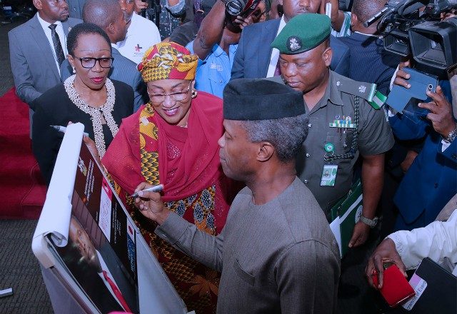 Acting President Yemi Osinbajo flanked by the Minister of Women Affairs, Senator Aisha Al-hassan and Permanent Secretary Ministry of Women Affairs, Phyllis Nwokedi during the launch on Tuesday…