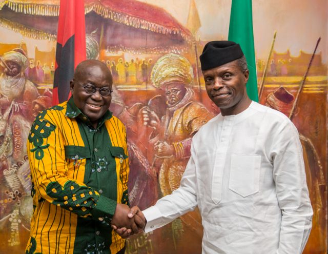 ...Visiting Ghanaian President Nana Akufo-Addo, left, with Ag President Yemi Osinbajo...