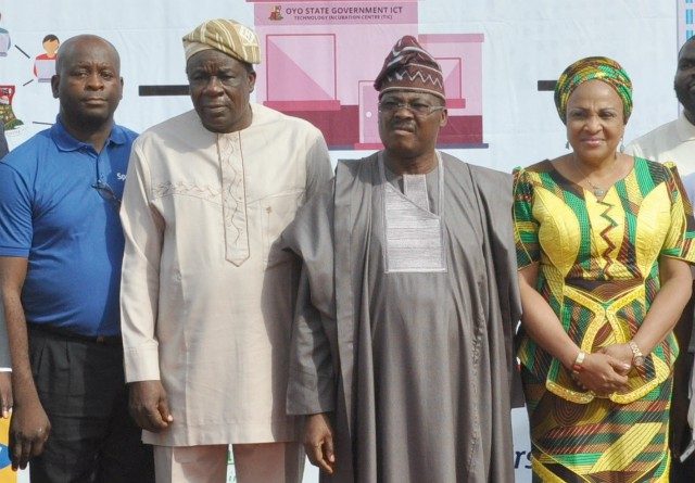 L-R: Sales Manager, Spectranet Everest Technologies Limited, Mr. Akinwumi Ariyo; Oyo State Deputy Governor, Chief Moses Adeyemo; the Governor, Senator Abiola Ajimobi; and his wife, Florence, during the inauguration of the state's e-governance initiative, at the Governor's Office, Ibadan... on Monday…