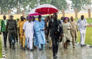Photo: When Aregbesola Defied The Rains To Inspect Projects In Ilesa Osun’s Gov Rauf Aregbesola (middle), Inspecting the on going project drenched in a heavy downpour. With him are Majority Leader, State House of Assembly, Hon Timothy Owoeye (5th left); Executive Secretary Ilesa East, Hon Adeoye Olusola (3rd right) and others…