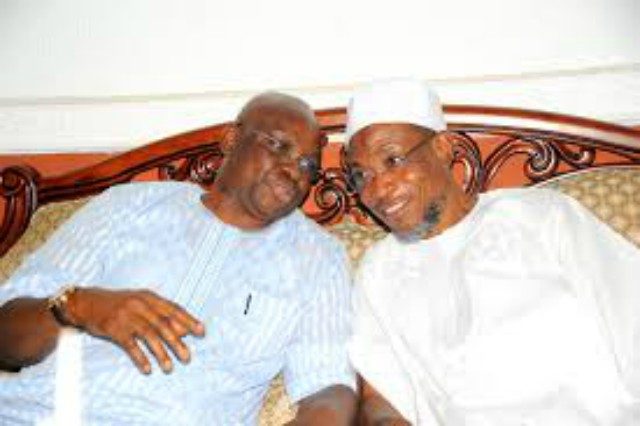 ...Govs Rauf Aregbesola, right, with his counterpart from Ekiti, Ayodele Fayose...two good heads?