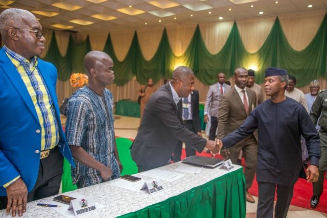 Ag President Yemi Osinbajo, right, with media gurus...second from left is Sina Oladehinde of Nigerian Tribune Newspapers...