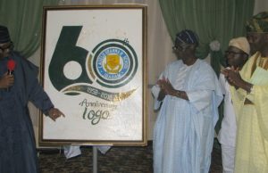Ajimobi Unveils Lagelu Grammar School Ibadan’s 60th Anniversary Logo Oyo Governor's Rep, Mr Olalekan Alli, left, unveiling the schools' 60th anniversary logo. He is being admired here from the right...Wale Adeoye, Dr Durodola Ogunsesan and Professor Olufemi Omisore...