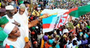 Only God Knows Who Will Succeed Me – Aregbesola Governor of Osun, Ogbeni Rauf Aregbesola; Candidate of All Progressive Congress (APC), for the Osun West Senatorial By-Election, Senator Mudashir Husain; Kebbi State Governor, Abubakar Bagudu (in blue cap); National Chairman, All Progressive Congress (APC), Chief John Oyegun, at the Mega Rally for the forthcoming Osun West Senatorial Bye-Election in the State, held in Iwo on Thursday…