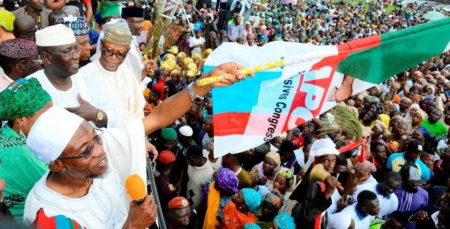 Governor of Osun, Ogbeni Rauf Aregbesola; Candidate of All Progressive Congress (APC), for the Osun West Senatorial By-Election, Senator Mudashir Husain; Kebbi State Governor, Abubakar Bagudu (in blue cap); National Chairman, All Progressive Congress (APC), Chief John Oyegun, at the Mega Rally for the forthcoming Osun West Senatorial Bye-Election in the State, held in Iwo on Thursday…