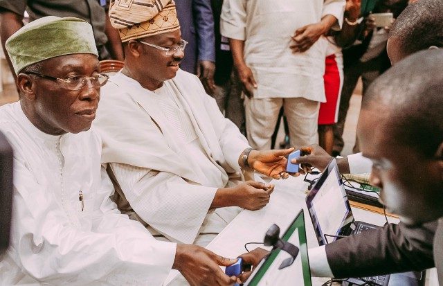 Minister of Agriculture and Rural Development, Chief Audu Ogbeh, left, with Oyo State Governor, Senator Abiola Ajimobi, being registered as farmers at a town hall meeting the minister held with farmers, youths, women and other agric stakeholders, at the State Secretariat, Ibadan... on Tuesday…