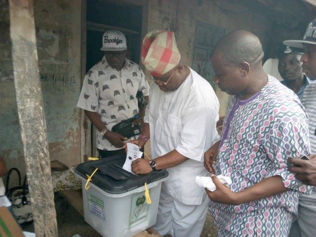 PDP Candidate, Ademola Adeleke casting his vote...in Ede...