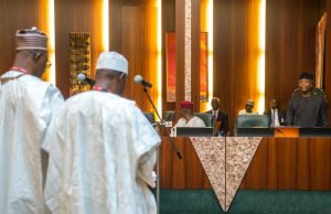 Photo: How New Ministers Were Sworn In By Osinbajo Acting President Yemi Osinbajo during the swearing in ceremony of the new ministers - Alhaji Shehu Hassan and Professor Stephen Ocheni…