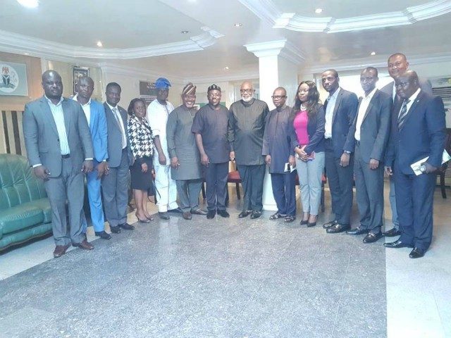 ...Governor Oluwarotimi Akeredolu, middle, with the visiting team from DAWN Commission...