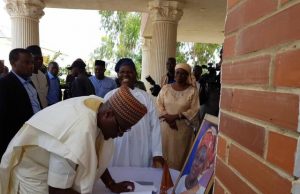 Kwara Governor Storms Ila Orangun To Comiserate With Bisi Akande Governor Abdulfatah Ahmed...signing the condolence register while Chief Bisi Akande looks on...