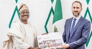 Perennial Flooding: Ajimobi’s Government Develops 20-Year Master Plan Oyo State Governor, Senator Abiola Ajimobi, left, receiving the final draft copy of the Ibadan city master plan from the representative of Design and Architecture Bureau Consulting Engineers (dar)/ Project Manager, Mr Yann Leclerq, at the Governor's Office, Ibadan...