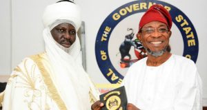 Photo: Aregbesola Hosts Emir Of Borgu In Osogbo Governor State of Osun, Ogbeni Rauf Aregbesola, right, presenting a plaque to the Emir of Borgu during the visit…at the Government House, Osogbo…