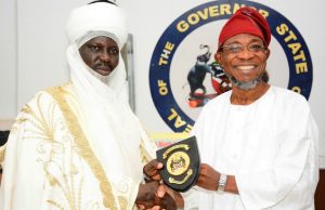 Peaceful Coexistence: Aregbesola, Emir Of Borgu Task Nigerians Governor State of Osun, Ogbeni Rauf Aregbesola, right, presenting a plaque to the Emir of Borgu during the visit…at the Government House, Osogbo…