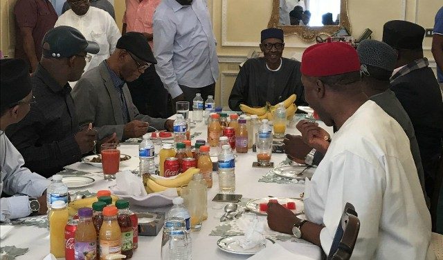 President Muhammadu Buhari, middle, with others at the said meeting in London on Sunday...