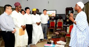 Aregbesola Inaugurates Board Of Skyrun Cocoa Industry Osun's Governor Rauf Aregbesola, right, with the board members...