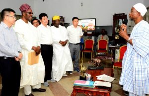 Aregbesola Inaugurates Board Of Skyrun Cocoa Industry Osun's Governor Rauf Aregbesola, right, with the board members...