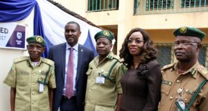 Stanbic IBTC Pension Managers Revamps Sanitary Facilities At Nigerian Prisons Training School R-L: Executive Director, Investments, Mr. Oladele Sotubo; Head, Business Development, Mrs. Nike Bajomo, both of Stanbic IBTC Pension Managers Limited (SIPML), handing over the keys to newly renovated blocks of sanitary facilities by SIPML at the Nigerian Prisons Services (NPS) Training College Kaduna to Commandant Prisons Staff College Kaduna, Asst. Controller General, Kehinde Fadipe; Commandant Prisons Training School Kaduna, Controller of Prisons, Patrick Ani; and Zonal Coordinator Zone B, Nigerian Prisons Service, Asst. Controller General, Musa Maiyaki, during the handing over ceremony and commissioning…