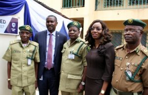 Stanbic IBTC Pension Managers Revamps Sanitary Facilities At Nigerian Prisons Training School R-L: Executive Director, Investments, Mr. Oladele Sotubo; Head, Business Development, Mrs. Nike Bajomo, both of Stanbic IBTC Pension Managers Limited (SIPML), handing over the keys to newly renovated blocks of sanitary facilities by SIPML at the Nigerian Prisons Services (NPS) Training College Kaduna to Commandant Prisons Staff College Kaduna, Asst. Controller General, Kehinde Fadipe; Commandant Prisons Training School Kaduna, Controller of Prisons, Patrick Ani; and Zonal Coordinator Zone B, Nigerian Prisons Service, Asst. Controller General, Musa Maiyaki, during the handing over ceremony and commissioning…