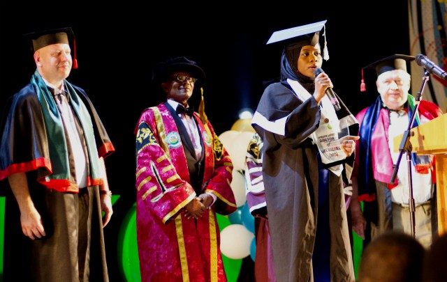 Best Graduating Medical student of V.N Karazin Kharkiv National University, Ukraine, Dr Lateefat Oyeleye Abiola delivering her convocation speech while Vice Chancellor, Osun State University (UNIOSUN), Vice President for Research and Education of the University, Prof Mykola O. Azarenkov, Prof. Labo Popoola (2nd left) and others listen, during the 2016/2017 Convocation Ceremony with 50 Students of Uniosun sponsored by Osun Government, at the Graduation Ceremony of the University on Friday 30th June, 2017…