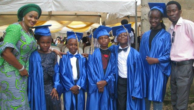Hajjia Bolatito Adebisi, the Proprietress of the school with some of the graduating students, on the far right is their teacher, Uncle Tunde…
