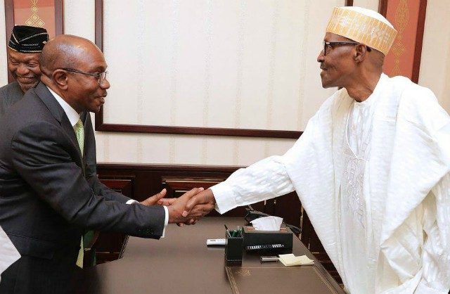 President Muhammadu Buhari, right, with the CBN Governor, Godwin Emefiele after a recent meeting...