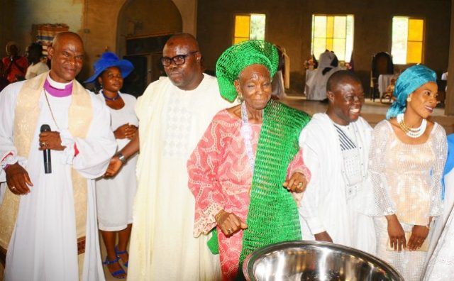 From the left, Diocesan Bishop of the African Church of All Saints Parish, Ikirun, Rt. Rev. Raphael Taiwo Osoniga, Special Adviser to Osun Governor on Information and Strategy, Mr Semiu Okanlawon, Mother of Osun Commissioner for Information and Strategy/newly installed Iya Ijo of the African Church of All Saints Parish, Ikirun, Chief (Mrs) Eunice Emiola Baderinwa, her son, Hon. Lani Baderinwa and his wife…at the event…