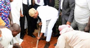 Mother’s Demise: Ooni, Osun Assembly Commiserate With Aregbesola Governor Rauf Aregbesola...performing the last duty for his late mother after the burial in Ilesa on Tuesday...