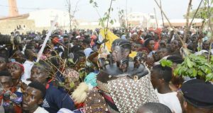 Photo: Annual Masquerade Festival Holds In Iwoland, Osun State ...a masquerade in Iwo, Osun State, with its followers...