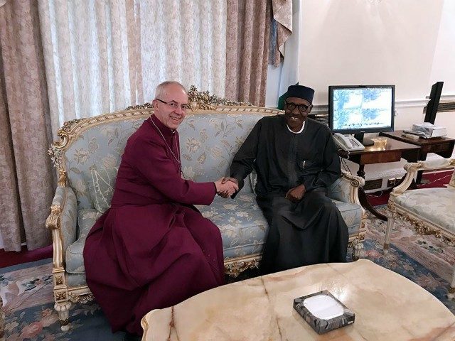 President Muhammadu Buhari, right, with the Archbishop...