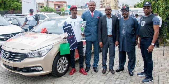 Presentation of Prize 1: l-r: Overall Winner, Nigeria National Freestyle Championship, Mr McCarthy Obanor, beside the Saloon Car donated by GAC Motors to 1st Prize Winner ; Chairman of Feet ‘n’ Tricks Limited, Valentine Ozigbo; Senior Sales Manager, CIG Motors Limited, distributor of GAC brands of vehicles in Nigeria, Mr. Phillip Eboka; National Coordinator, Federal Engagement and Enlightenment Tax Teams, Federal Inland Revenue Services(FIRS), Alhaji Kunle Oseni; CEO, Feet ‘n’ Tricks Limited, Mr O’Dyke Nzewi, at the presentation ceremony of prizes to winners of the Nigeria National Freestyle Championship organised by Feet ‘n’ Tricks Limited , in Lagos on Monday