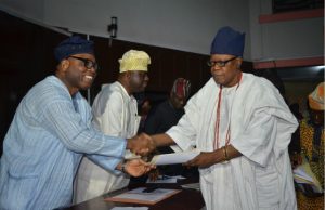 Despite Olubadan’s Resistance, Oyo Government Gives Certificates To 21 Obas, Coronation Holds On Sunday Oba Lekan Balogun, right, receives his certificate from the representative of the Government of Oyo State, Mr Olalekan Alli, the SSG...