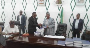 Olubadan Chieftaincy Issue: Ajimobi Receives Commission’s Report The Oyo State Governor, Sen. Abiola Ajimobi received the reports from the chairman of the commission, Rtd. Justice Ookanola Boade at the executive chambers of the Governor's Office, Secretariat, Ibadan…