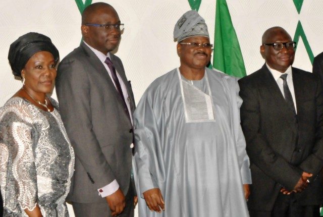 L-R: A member of the Oyo State Judicial Service Commission, Mrs. Esther Akerele; another member and state's Attorney-General and Commissioner for Justice, Mr. Seun Abimbola; State Governor, Senator Abiola Ajimobi; and Chairman of the JSC/Chief Judge of the state, Justice Munta Abimbola, during the inauguration of the commission, at the Governor's Office, Ibadan... on Friday